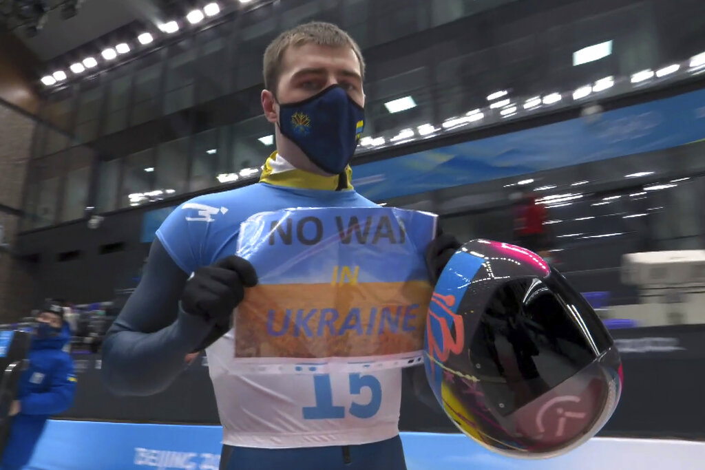 Olympic athlete protests Ukraine conflict as China threatens crackdown on dissent