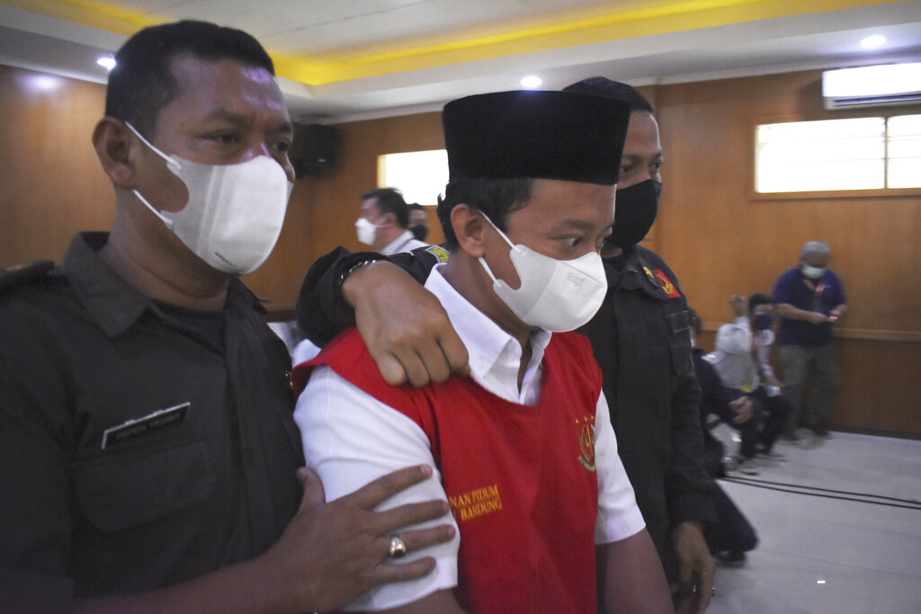 Indonesian principal sentenced to life in prison for raping at least 13 students