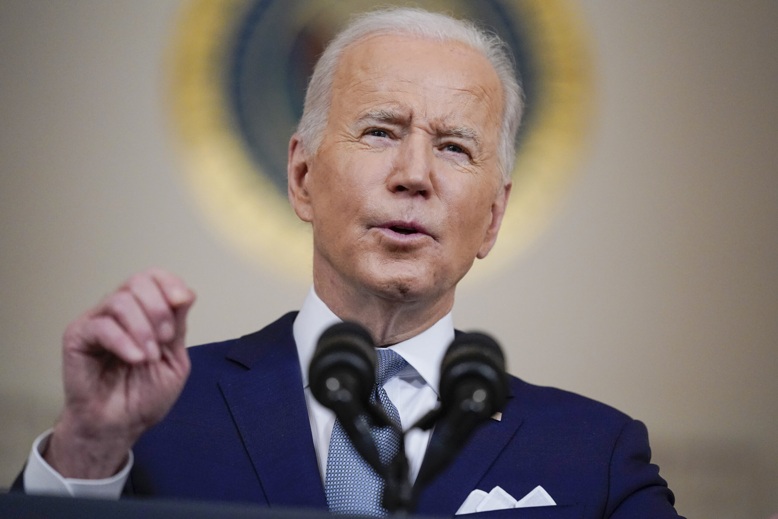Biden condemns Putin and swipes at Trump in State of the Union address