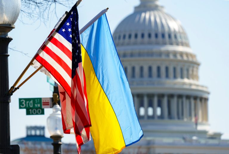 The flags of Ukraine, the United States, and the District of Columbia fly together on Pennsylvania Avenue near the Capitol, Saturday, March 5, 2022, by order of the mayor of Washington. 