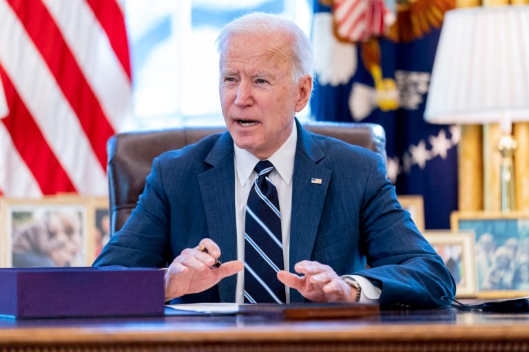Two years after WHO pandemic declaration, Biden still lags public on COVID