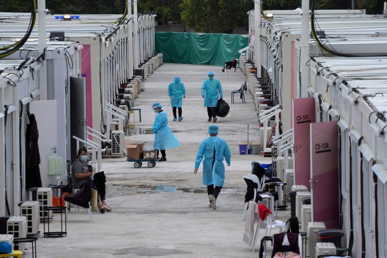 Nearly 300,000 Hong Kong residents in isolation amid COVID-19 surge