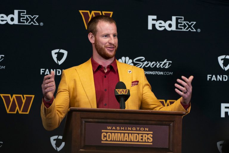 SEE IT: Carson Wentz sacked by criticism of suit at Commanders press conference