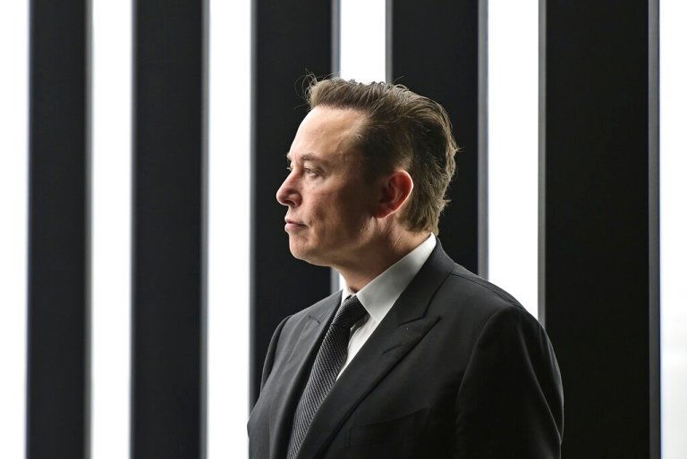 Elon Musk attends the opening of the Tesla factory Berlin Brandenburg in Gruenheide, Germany, Tuesday, March 22, 2022.