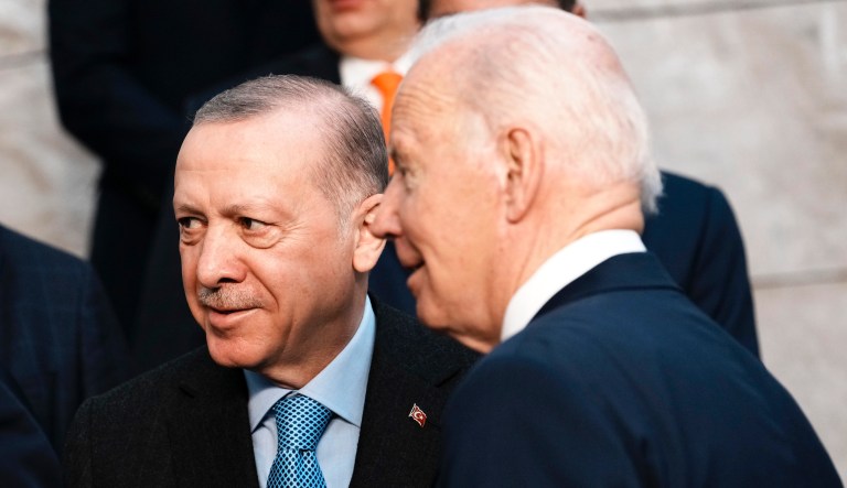 U.S. President Joe Biden, right, speaks with Turkish President Recep Tayyip Erdogan at a group photo during an extraordinary NATO summit at NATO headquarters in Brussels, Thursday, March 24, 2022.