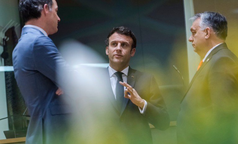 Hungarian Prime Minister Viktor Orban speaks with Belgium's Prime Minister Alexander De Croo and French President Emmanuel Macron in Brussels in March. EU leaders are slated to vote on a Russian oil ban as early as this week as part of their sixth round of sanctions against Moscow. (AP/Geert Vanden Wijngaert)