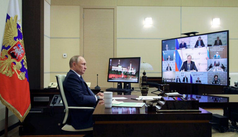 Putin may be self-isolating and placing advisers on house arrest, Biden says