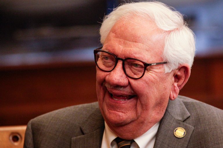 Kansas state Sen. Rick Wilborn, R-McPherson, relaxes with colleagues after redistricting plans for the Kansas Senate, House and State Board of Education, won approval by bipartisan majorities, Wednesday, March 30, 2022, at the Statehouse in Topeka, Kan. Wilborn is chair of the Senate Redistricting Committee. 