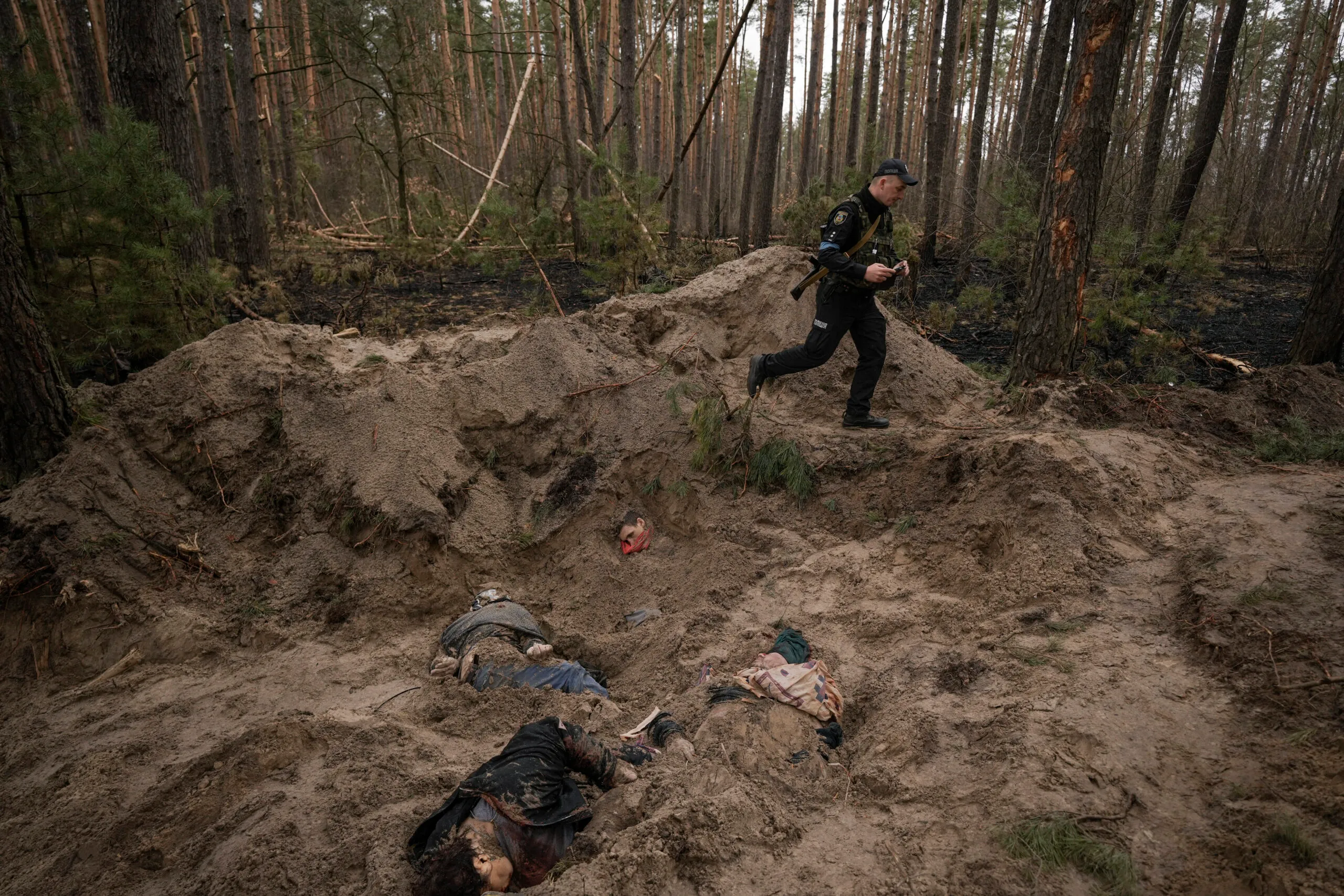 Ukrainian mayor found tortured and executed beside family in shallow grave