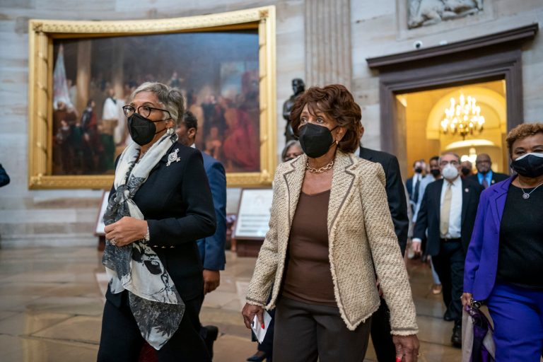 Members of the Congressional Black Caucus, with Rep. Joyce Beatty, D-Ohio, left, and Rep. Maxine Waters, D-California, right, walk from the House to the Senate chamber to attend the vote to confirm Supreme Court nominee Ketanji Brown Jackson at the Capitol in Washington on April 7, 2022.