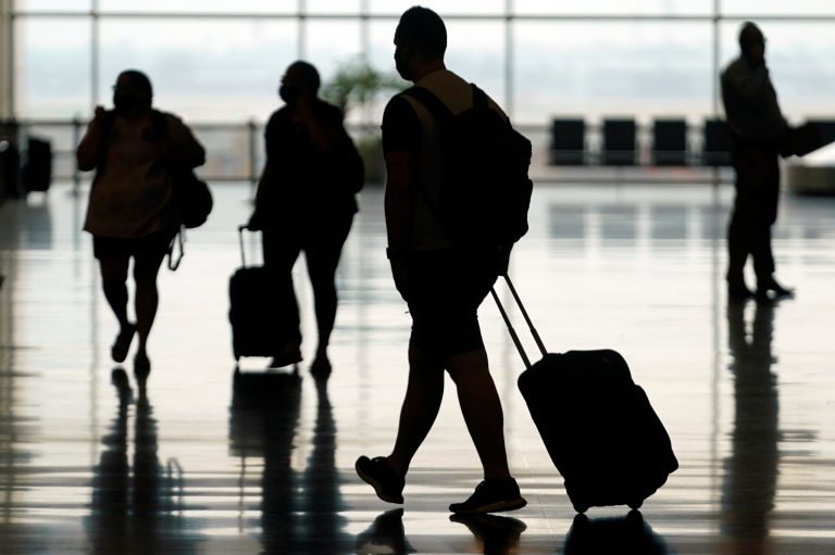 Woman duct-taped on flight owes $82,000 fine