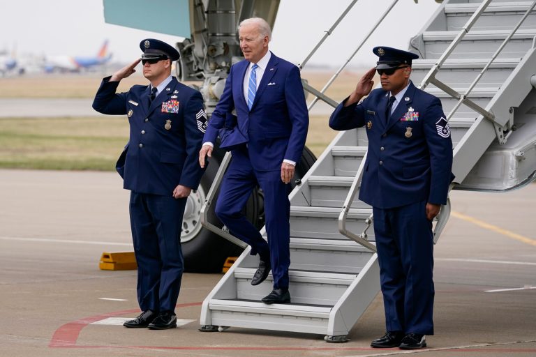 President Joe Biden arrives on Air Force One at Des Moines International Airport in Des Moines, Iowa, on Tuesday en route to Menlo, Iowa. 