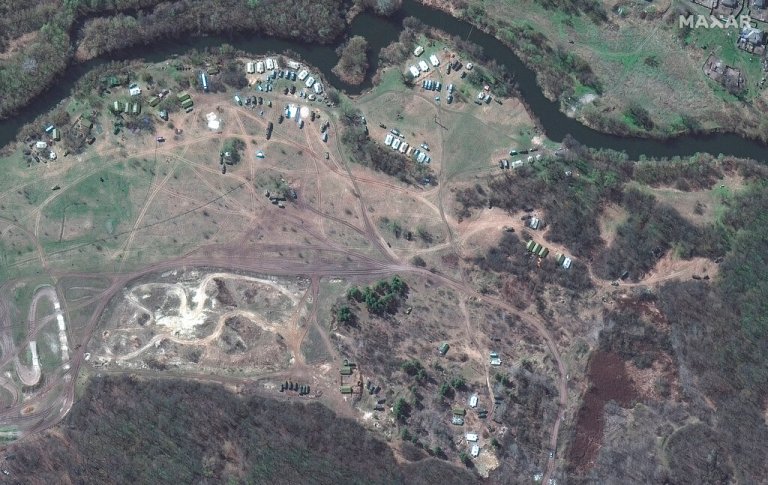 This satellite image provided by Maxar Technologies shows a new deployment of troops, tents and vehicles west of Soloti, Russia, Monday, April 11, 2022. 