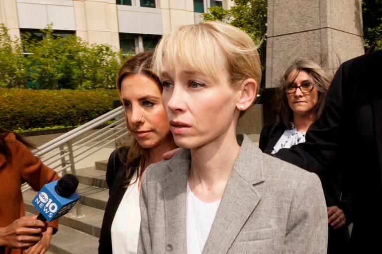 Sherri Papini of Redding leaves the federal courthouse after her arraignment in Sacramento, California, on April 13, 2022.