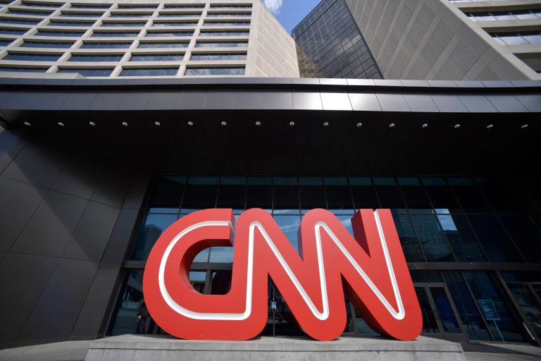 The CNN logo is displayed outside the CNN Center located in Atlanta. The network announced it will move its operations from the CNN Center by the end of 2023.  