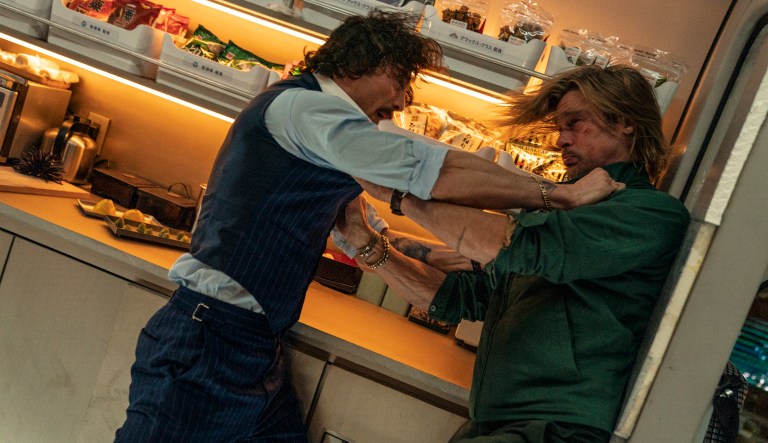 This image released by Sony Pictures shows Aaron Taylor-Johnson, left, and Brad Pitt in a scene from 