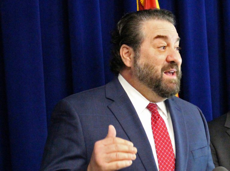 FILE - Arizona Attorney General Mark Brnovich speaks at a news conference in Phoenix, Jan. 7, 2020. On Friday, April 29, 2022, a judge in Prescott, Ariz., seemed skeptical of arguments brought by Republican Attorney General Brnovich that he should order Democratic Secretary of State Katie Hobbs to completely rewrite a set of election rules because Brnovich won't approve them. 