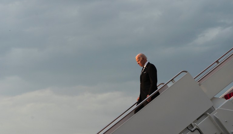 President Joe Biden exits Air Force One at sunset, Sunday, May 1, 2022, at Andrews Air Force Base, Md., on return from Minneapolis where he spoke at the memorial service of former Vice President Walter Mondale.