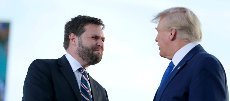 Senate candidate JD Vance, left, greets former President Donald Trump at a rally at the Delaware County Fairground, April 23, 2022, in Delaware, Ohio, to endorse Republican candidates ahead of the Ohio primary on May 3. 