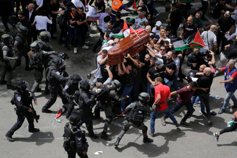 Violence breaks out at funeral for slain Al Jazeera journalist Israeli police confront with mourners as they carry the casket of slain Al Jazeera veteran journalist Shireen Abu Akleh during her funeral in east Jerusalem, Friday, May 13, 2022. Abu Akleh, a Palestinian-American reporter who covered the Mideast conflict for more than 25 years, was shot dead Wednesday during an Israeli military raid in the West Bank town of Jenin.
