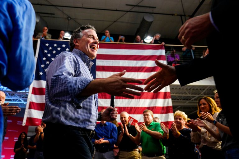David McCormick, a Republican candidate for U.S. Senate in Pennsylvania, meets with attendees during a campaign stop in Lititz, Friday, May 13, 2022. 
