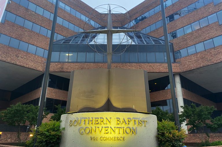 A cross and Bible sculpture stand outside the Southern Baptist Convention headquarters in Nashville, Tenn., on Tuesday, May 24, 2022. On Tuesday, top administrative leaders for the SBC, the largest Protestant denomination in America, said that they will release a secret list of hundreds of pastors and other church-affiliated personnel accused of sexual abuse. 