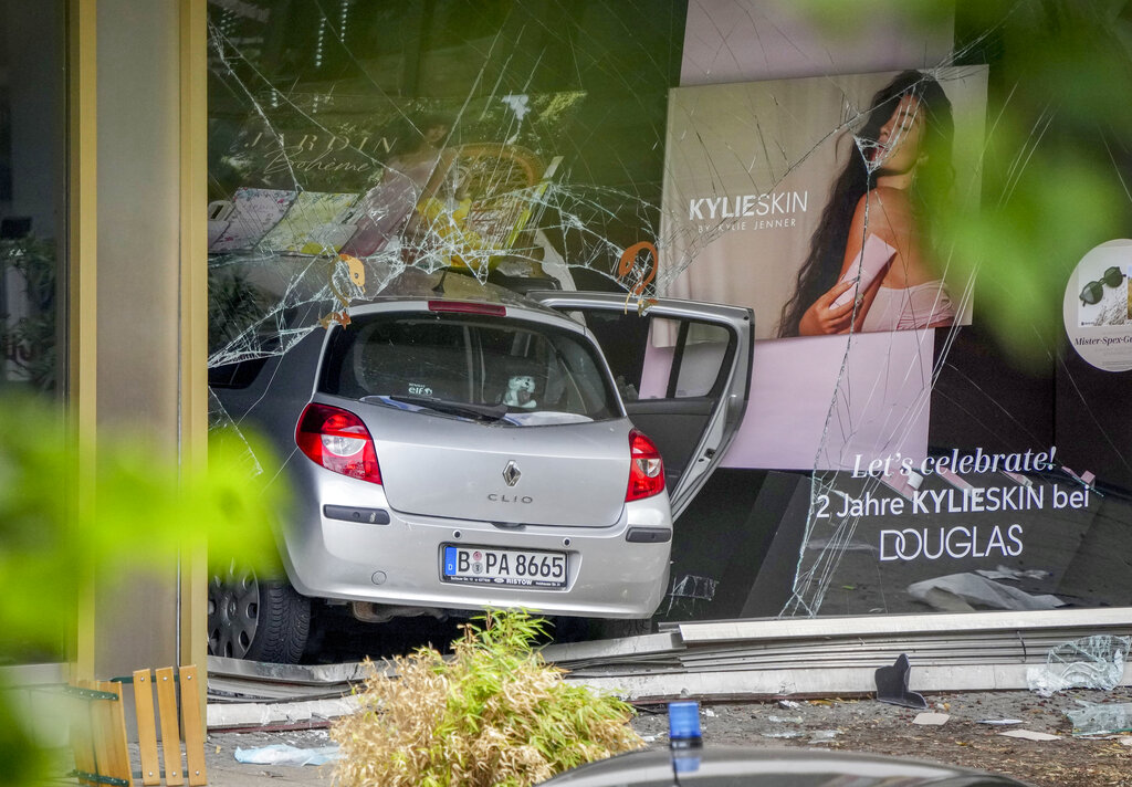 One dead and 30 injured after man drives car into crowd near Berlin church