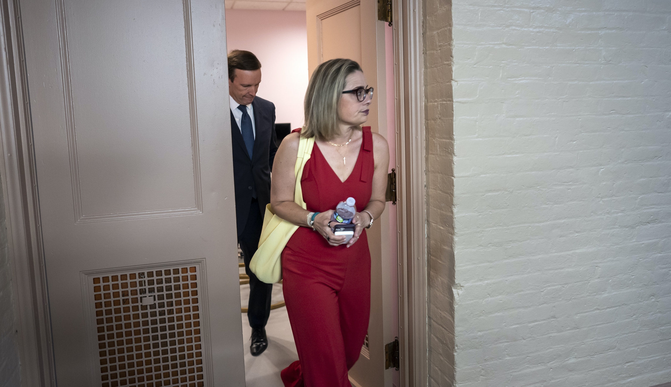 Sinema signs off on Manchin-Schumer spending bill