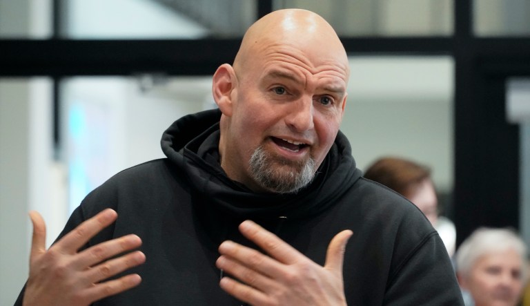 Pennsylvania Lt. Gov. John Fetterman visits with people attending a Democratic Party event.