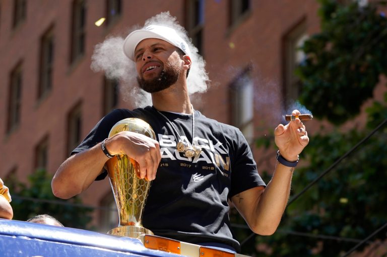 Stephen Curry celebrates.
