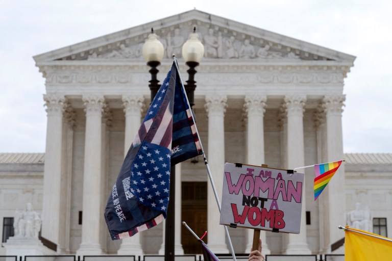 Abortion-rights activists protest outside of the U.S. Supreme Court on Capitol Hill in Washington, Tuesday, June 21, 2022. The American Medical Association has described governments intruding into medicine and impeding access to reproductive health services as, âa violation of human rights.â (AP Photo/Jose Luis Magana)