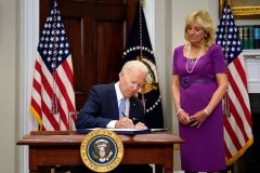 Biden hopes to defy midterm election history after signing gun law