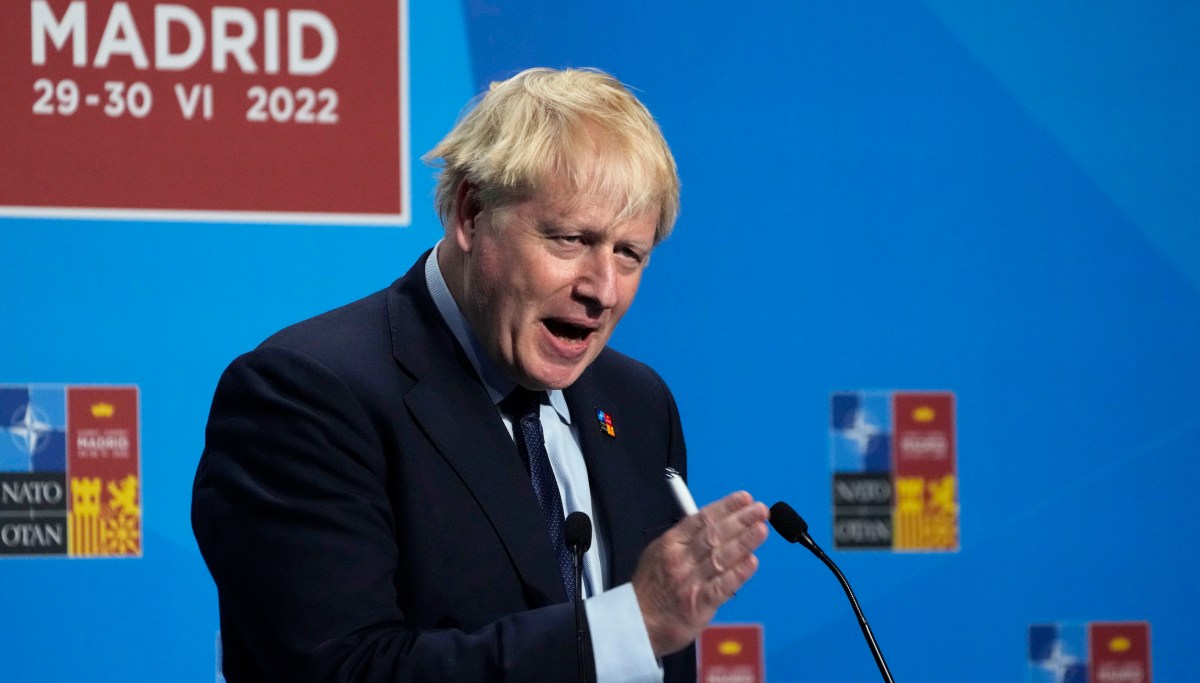 Boris Johnson fights for survival as top ministers resign