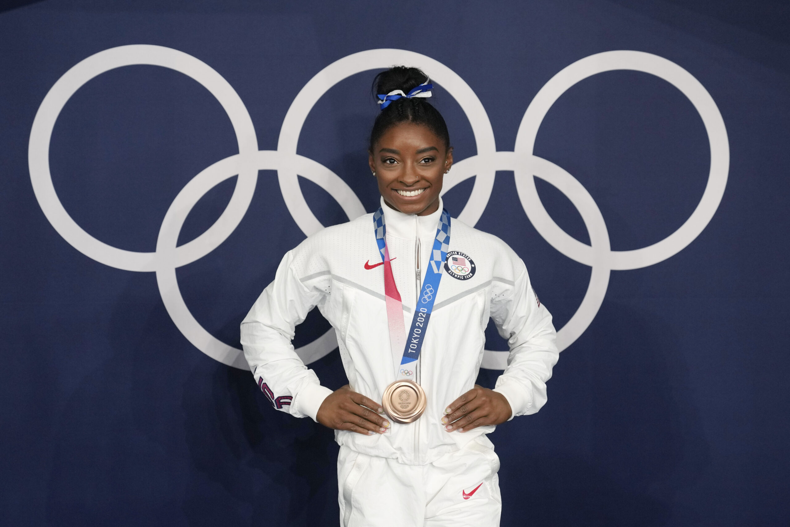 SEE IT: Simone Biles mistaken for child by flight attendant