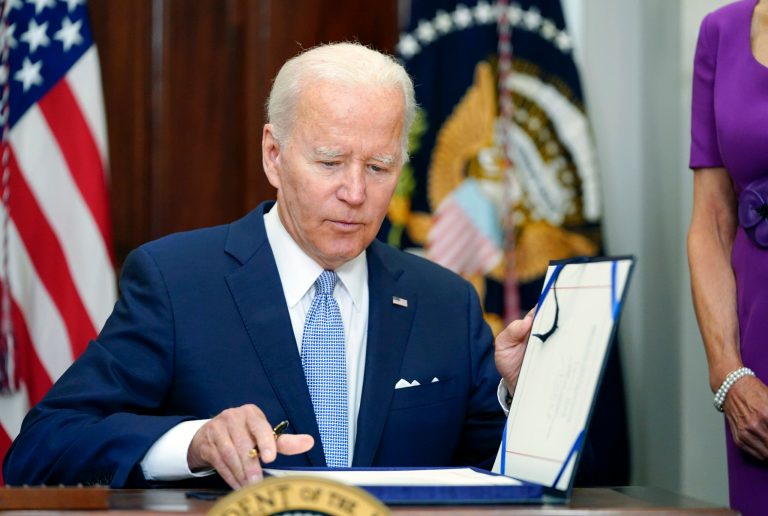 FILE - President Joe Biden signs into law S. 2938, the Bipartisan Safer Communities Act gun safety bill, in the Roosevelt Room of the White House in Washington, Saturday, June 25, 2022. A poll released on July 11, 2022 by the New York Times found that most Democrats do not want Biden to run for reelection in 2024. (AP Photo/Pablo Martinez Monsivais, File)