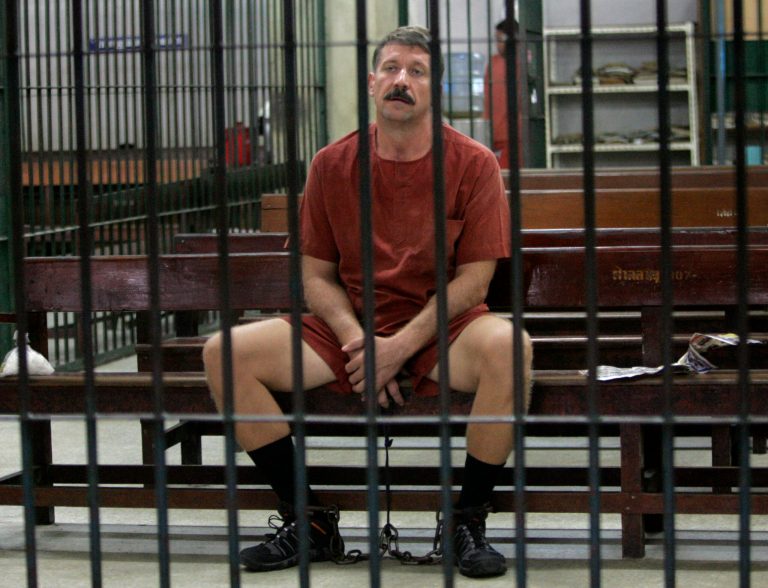 Viktor Bout sits while waiting for his verdict.