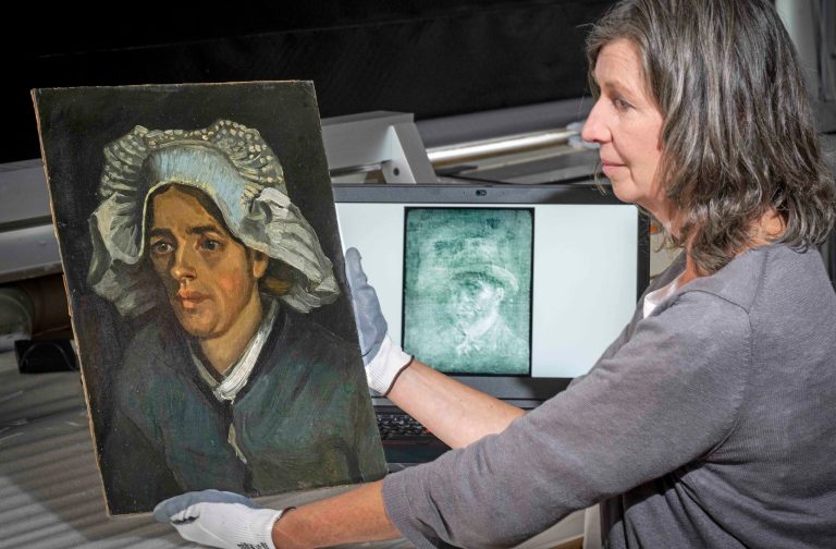Senior Conservator Lesley Stevenson views Vincent Van Gogh's 