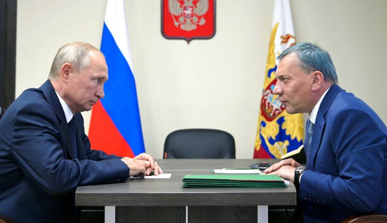 Putin reshuffles top officials, including arms chief Putin reshuffles top officials, including arms chief