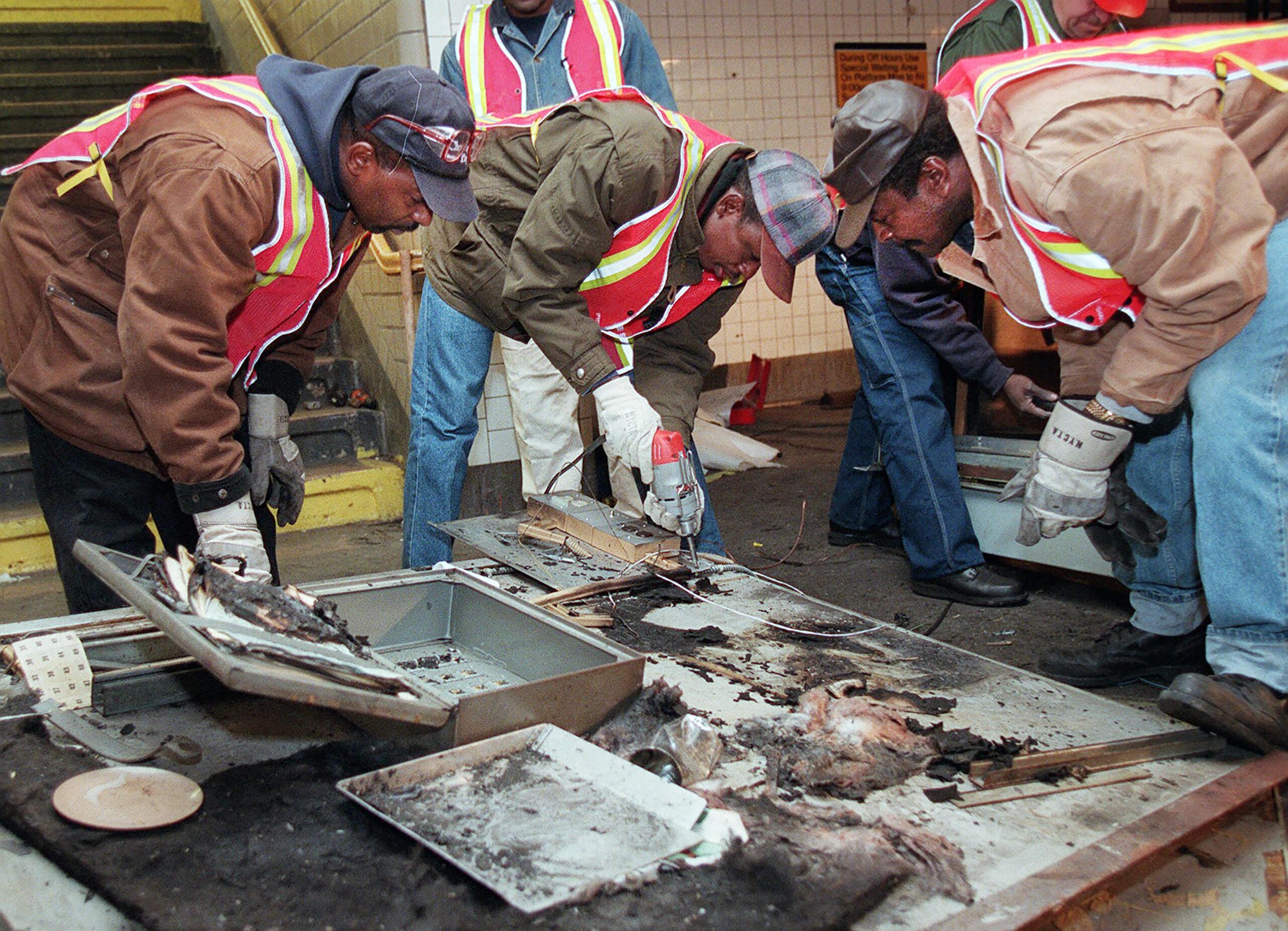 Three men cleared in 1995 NYC subway toll booth murder