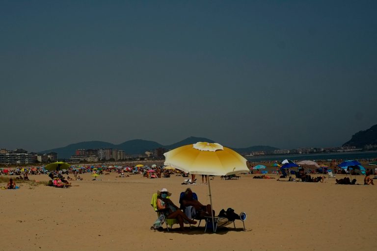 Wind sweeps up beach umbrella, impales woman