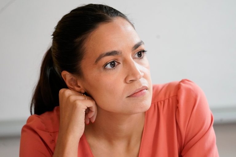 Rep. Alexandria Ocasio-Cortez, D-N.Y., is seen during a meeting at the Chhaya Community Development Corporation in 2022 in New York.