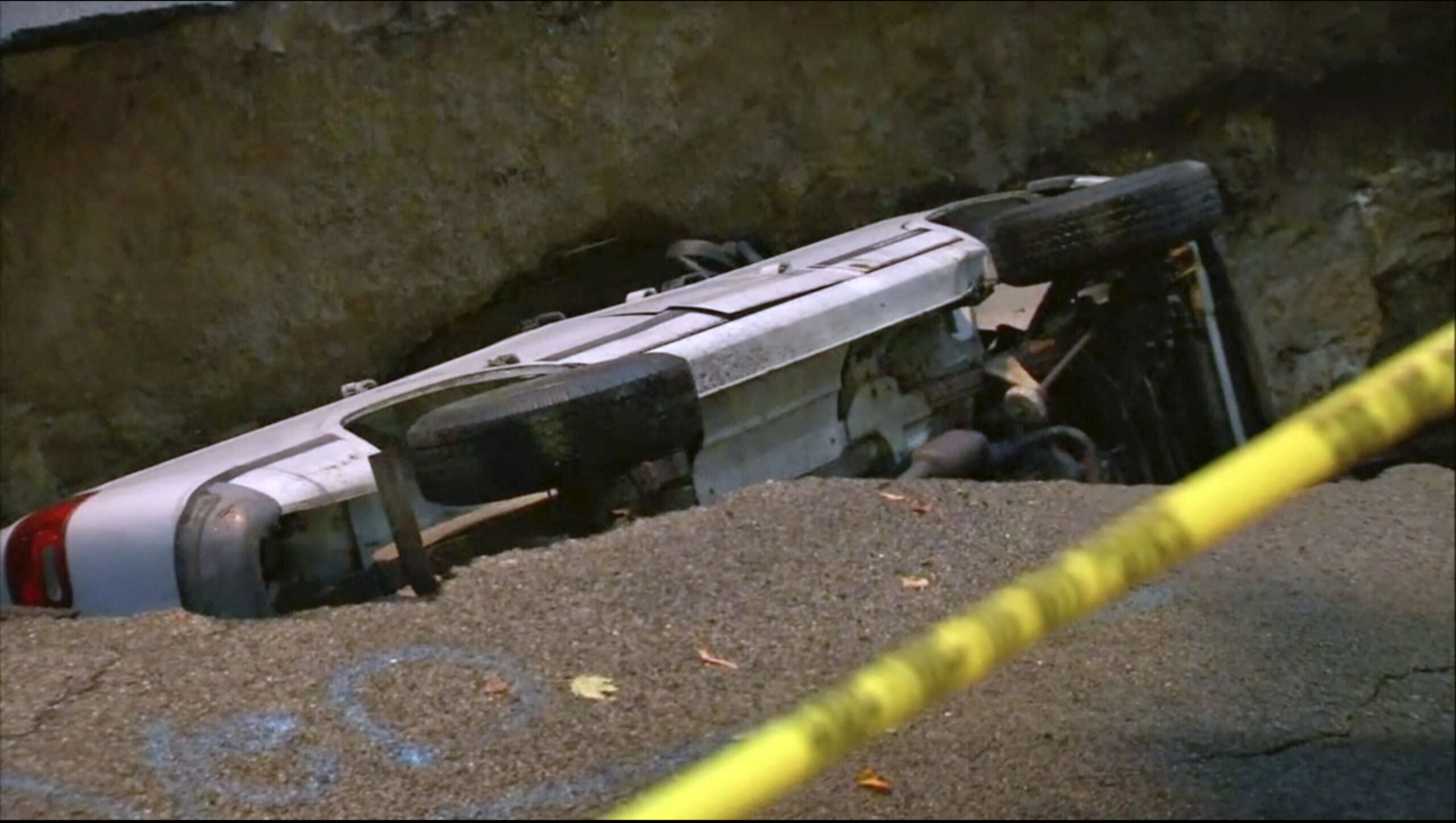 Giant sinkhole in New York City swallows van