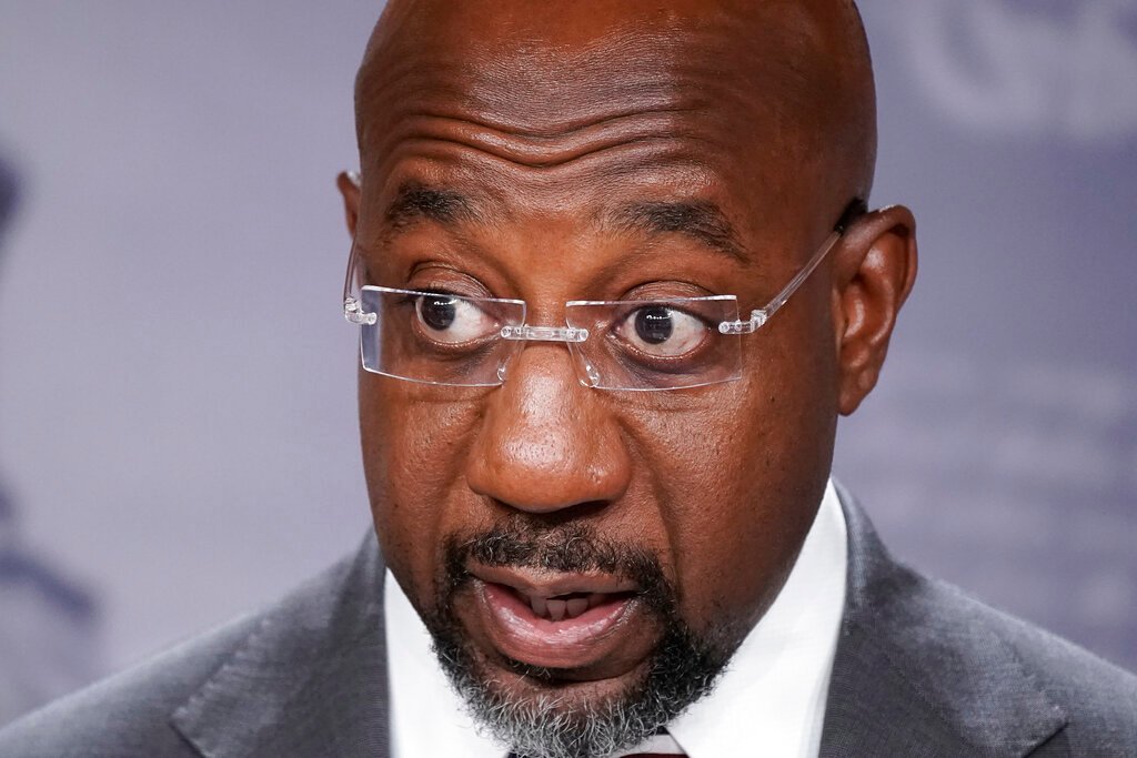 Warnock spending blitz eclipsed only by presidential campaigns: Analysis
