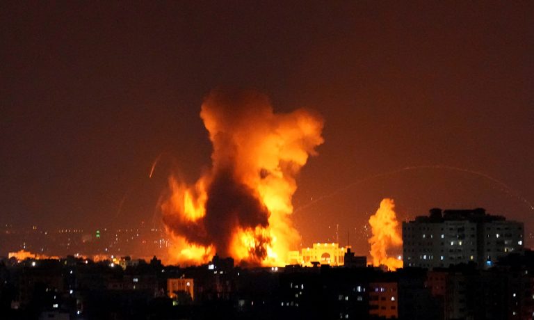 Smoke rises following Israeli airstrikes on a building in Gaza City.