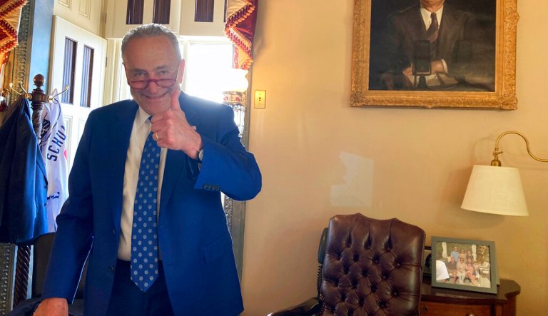 Senate Democrats celebrate passing Manchin-Schumer reconciliation package