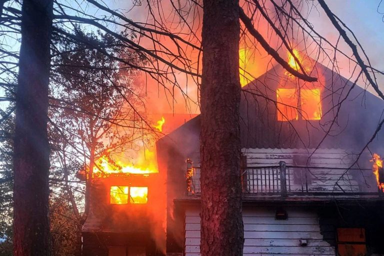 This photo provided by the Liberty Township Fire Department shows a fire that consumed a building at the site of the long-closed Grossinger's resort in Liberty, New York, on Tuesday.