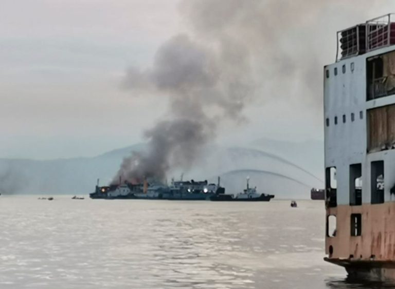 Smoke is seen from the M/V Asia Philippines, an inter-island cargo and passenger vessel, as it caught fire while it was approaching Batangas port, southern Philippines on Friday Aug. 26, 2022.