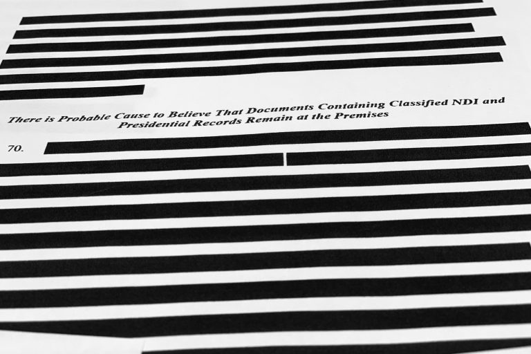 Pages from the affidavit by the FBI in support of obtaining a search warrant for former President Donald Trump's Mar-a-Lago estate are photographed Aug. 26.