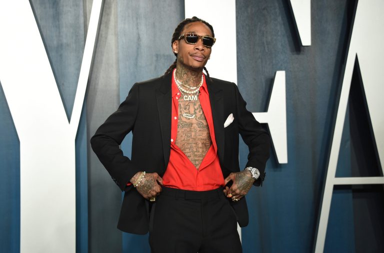 Police say rapper Wiz Khalifa cut short a concert in suburban Indianapolis as people began fleeing the outdoor venue Friday night, Aug. 26, 2022, leaving three with minor injuries, following a disturbance