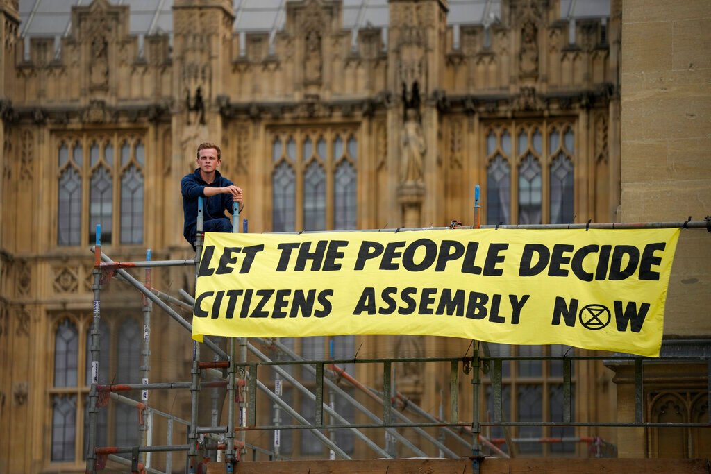 SEE IT: Climate change protesters break into British parliamentary chamber